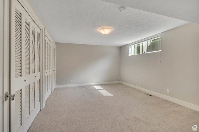 2241 E Melodie Ann Way, Holladay, UT 84124 - unfurnished bedroom featuring two closets and light carpet