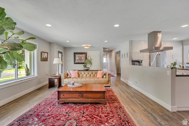 2241 E Melodie Ann Way, Holladay, UT 84124 - living area with light wood finished floors and recessed lighting