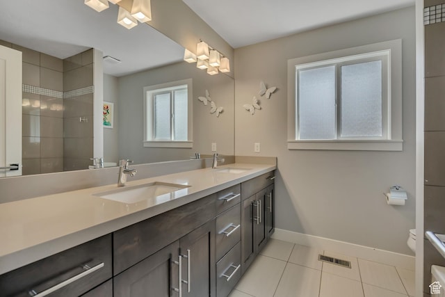 2241 E Melodie Ann Way, Holladay, UT 84124 - full bath with double vanity, tile patterned floors, and a tile shower