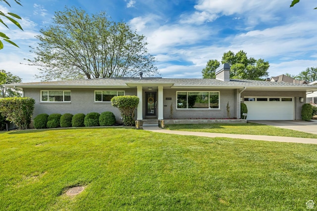 2241 E Melodie Ann Way, Holladay, UT 84124 - ranch-style home featuring an attached garage, a chimney, brick siding, and a front lawn