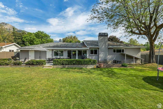 2241 E Melodie Ann Way, Holladay, UT 84124 - rear view of house with a chimney and a patio