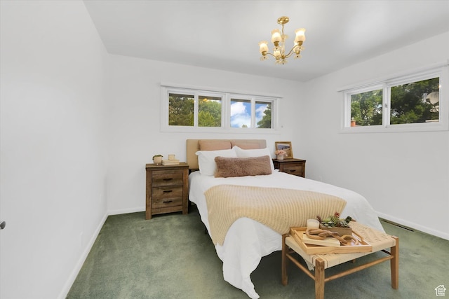 871 N 400 E, Logan, UT 84321 - carpeted bedroom featuring a chandelier and baseboards