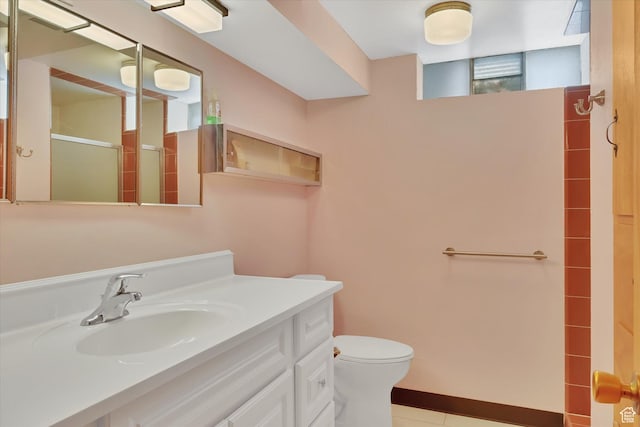 871 N 400 E, Logan, UT 84321 - bathroom featuring a stall shower, vanity, and tile patterned flooring