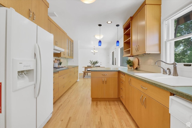 871 N 400 E, Logan, UT 84321 - kitchen featuring white appliances, a peninsula, light wood-type flooring, under cabinet range hood, and open shelves
