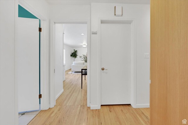 871 N 400 E, Logan, UT 84321 - hallway with light wood finished floors and baseboards