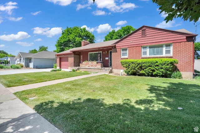 871 N 400 E, Logan, UT 84321 - single story home featuring brick siding, a garage, a chimney, and a front lawn