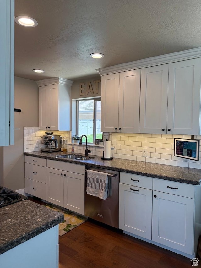 930 N 650 E, Bountiful, UT 84010 - kitchen featuring dishwasher, dark wood finished floors, dark stone countertops, backsplash, and recessed lighting