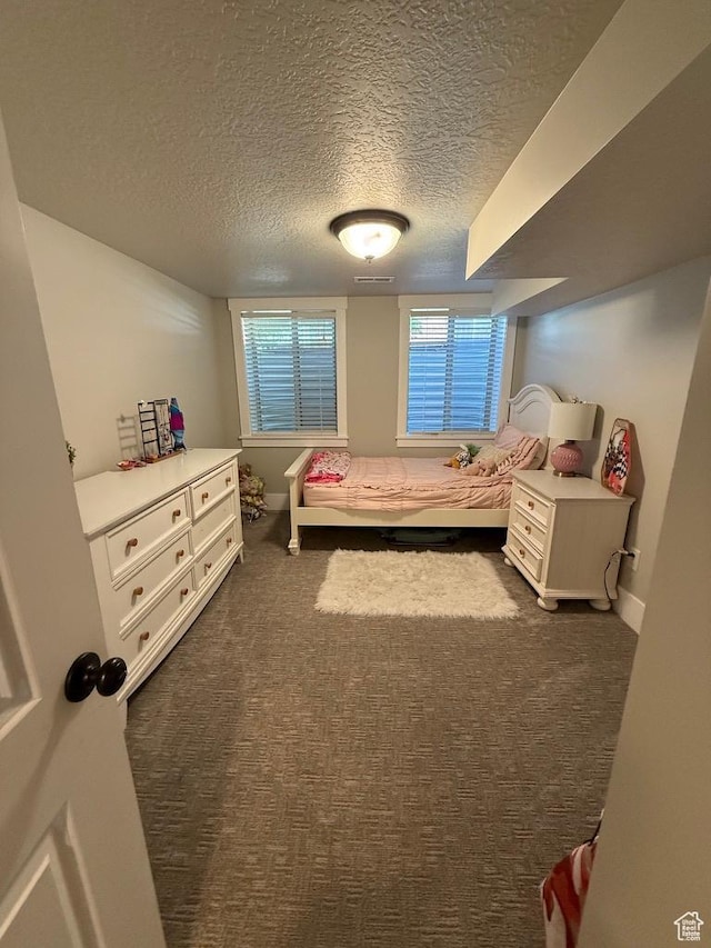 930 N 650 E, Bountiful, UT 84010 - bedroom with a textured ceiling and dark colored carpet