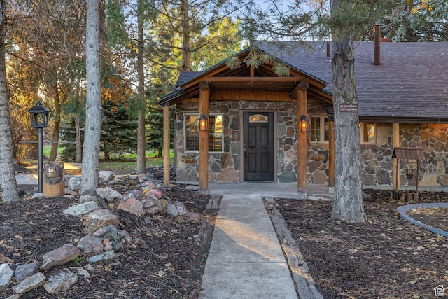210 S 100 E, Fielding, UT 84311 - entrance to property with stone siding and roof with shingles