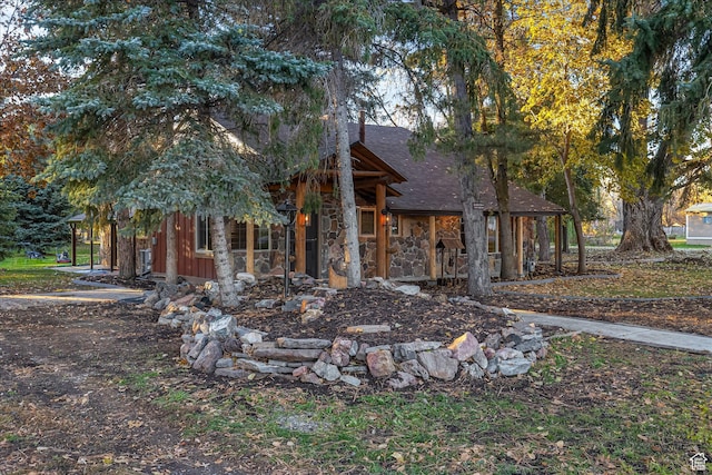 210 S 100 E, Fielding, UT 84311 - view of front facade featuring a shingled roof and stone siding