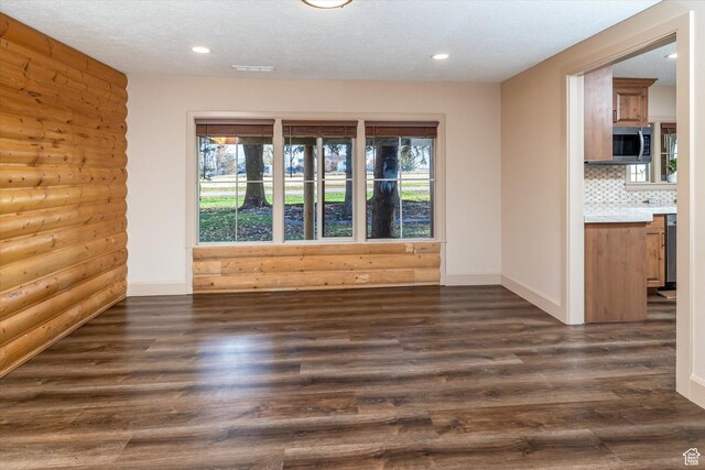 210 S 100 E, Fielding, UT 84311 - spare room featuring dark wood-style floors and recessed lighting