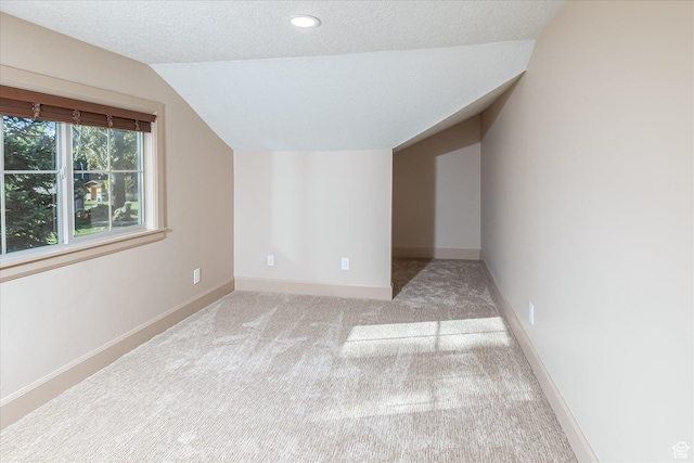 210 S 100 E, Fielding, UT 84311 - additional living space featuring vaulted ceiling, carpet, a textured ceiling, and recessed lighting