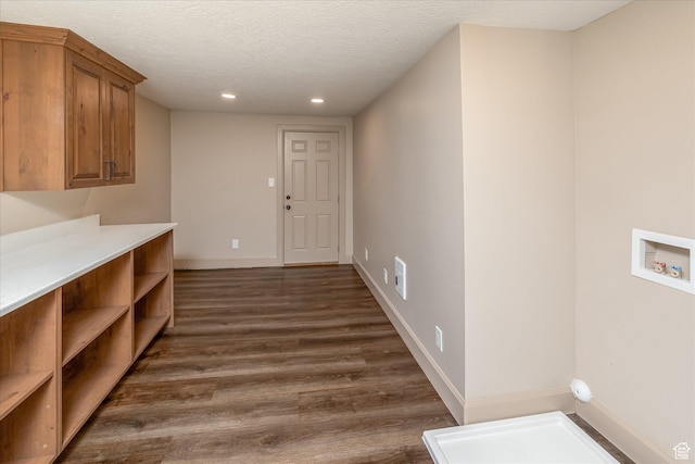 210 S 100 E, Fielding, UT 84311 - washroom featuring recessed lighting, dark wood finished floors, hookup for a washing machine, a textured ceiling, and cabinet space