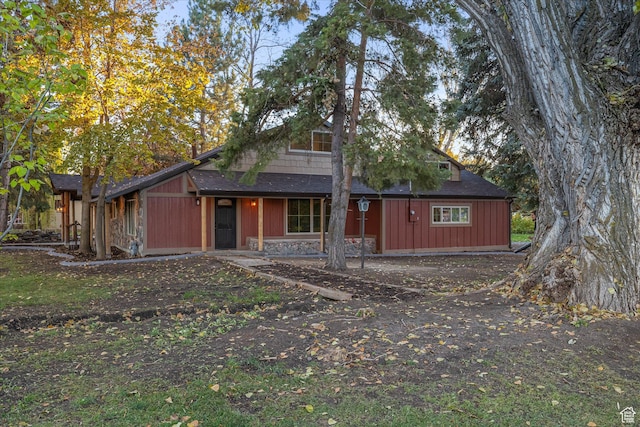 210 S 100 E, Fielding, UT 84311 - view of front of house featuring stone siding and roof with shingles
