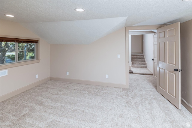 210 S 100 E, Fielding, UT 84311 - bonus room with a textured ceiling, lofted ceiling, carpet, stairs, and recessed lighting