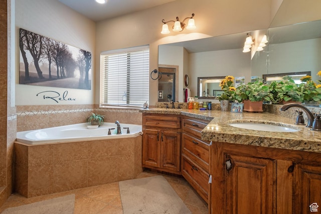 258 E Red Leaf Dr, Draper, UT 84020 - bathroom featuring tile patterned floors, double vanity, and a garden tub