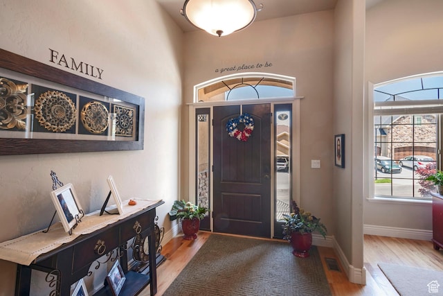 258 E Red Leaf Dr, Draper, UT 84020 - entrance foyer featuring light wood-type flooring and a towering ceiling