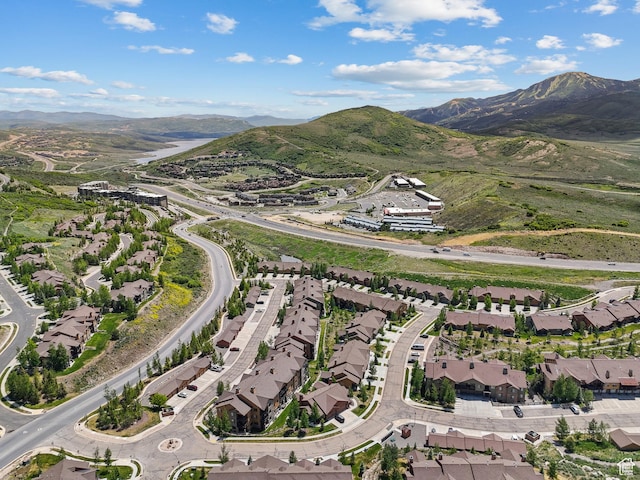 14275 N Buck Horn Trl Unit 41-F, Kamas, UT 84036 - aerial view of property and surrounding area featuring a mountainous background and nearby suburban area