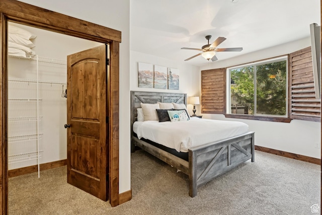 14275 N Buck Horn Trl Unit 41-F, Kamas, UT 84036 - bedroom with light carpet, ceiling fan, a closet, and a spacious closet