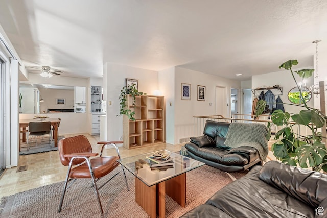 4797 S 2124 E, Holladay, UT 84117 - living room featuring ceiling fan and baseboards