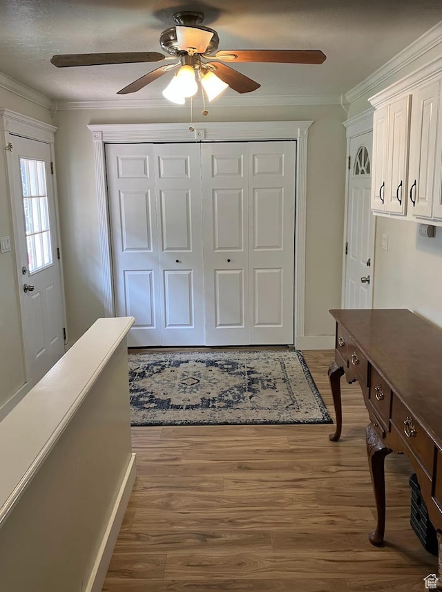 12900 S 2200 W, Riverton, UT 84065 - entryway featuring ceiling fan, ornamental molding, and wood finished floors