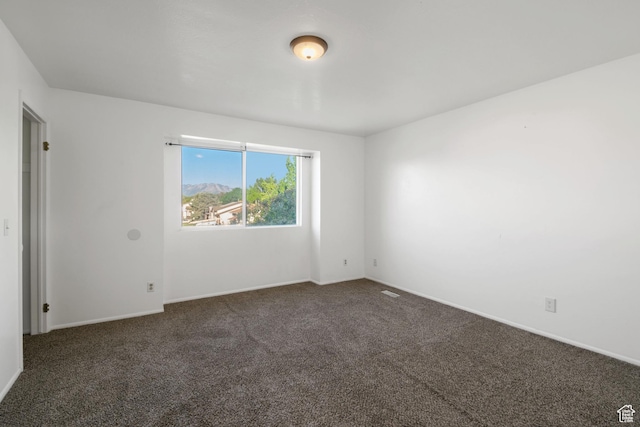 3638 Oldham Cir, West Valley City, UT 84120 - carpeted empty room with baseboards