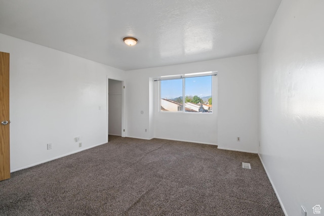 3638 Oldham Cir, West Valley City, UT 84120 - carpeted spare room with baseboards