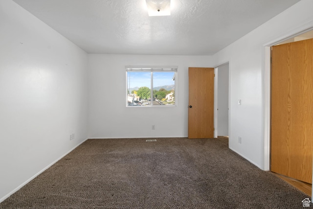 3638 Oldham Cir, West Valley City, UT 84120 - empty room with carpet floors and baseboards