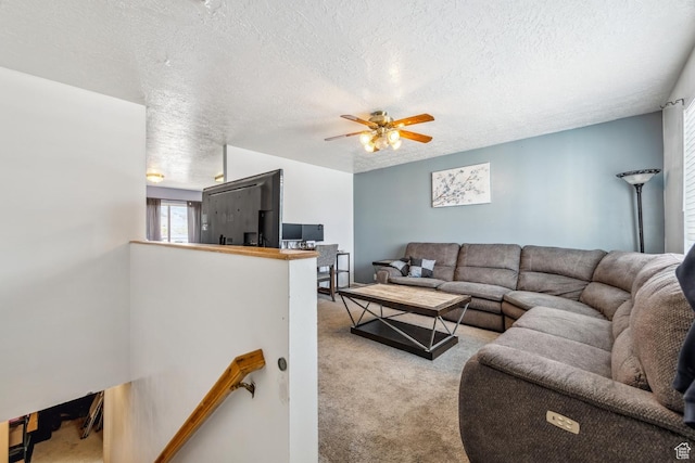 615 W 1080 S, Tooele, UT 84074 - living room featuring carpet floors, a ceiling fan, and a textured ceiling