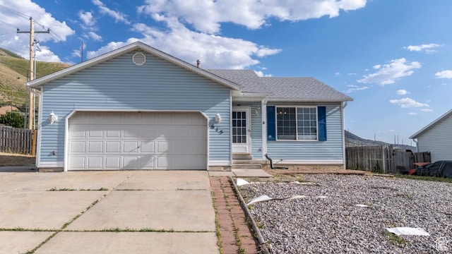 615 W 1080 S, Tooele, UT 84074 - ranch-style house featuring concrete driveway and an attached garage