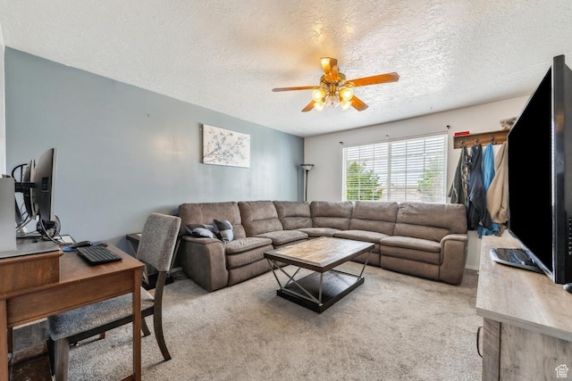 615 W 1080 S, Tooele, UT 84074 - living area featuring ceiling fan, a textured ceiling, carpet flooring, and a desk