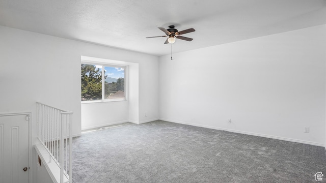 607 N 2000 W, West Point, UT 84015 - spare room with ceiling fan and carpet flooring