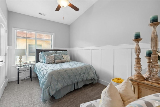 5538 N Turin Ln, Highland, UT 84003 - bedroom with carpet, a decorative wall, lofted ceiling, a wainscoted wall, and a ceiling fan