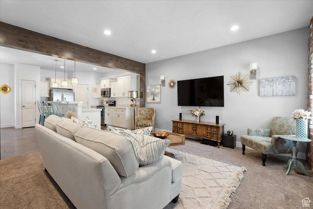 5538 N Turin Ln, Highland, UT 84003 - living area with recessed lighting, beamed ceiling, and light colored carpet
