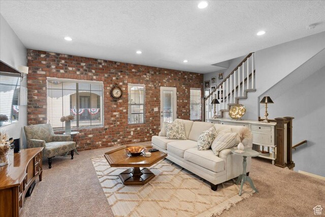 5538 N Turin Ln, Highland, UT 84003 - carpeted living room with a textured ceiling, recessed lighting, and stairs