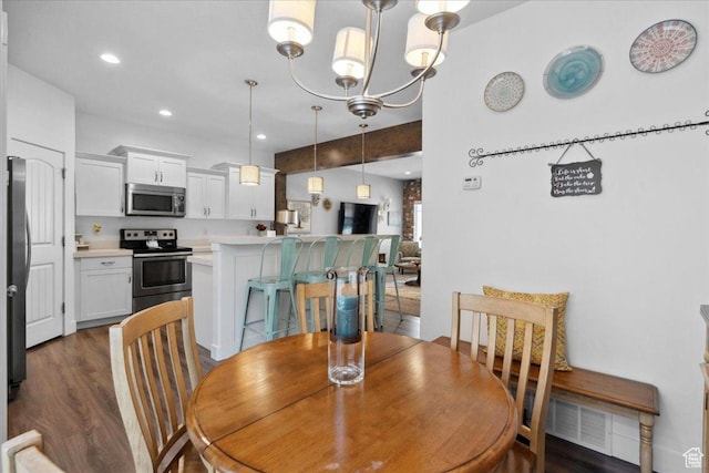 5538 N Turin Ln, Highland, UT 84003 - dining room with dark wood-style floors, a chandelier, and recessed lighting
