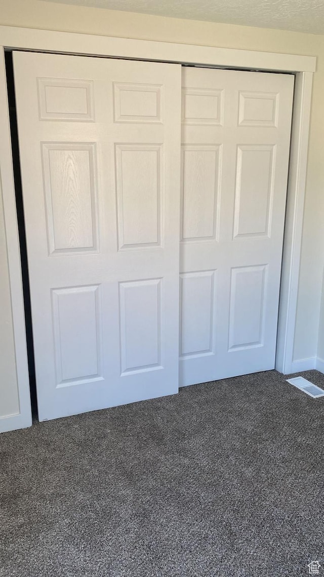 371 Broadmoor Ave, Ogden, UT 84404 - unfurnished bedroom featuring carpet floors and a closet