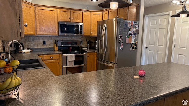1205 E Privet Dr S Unit 101, Cottonwood Heights, UT 84121 - kitchen with appliances with stainless steel finishes, decorative backsplash, dark countertops, and brown cabinetry