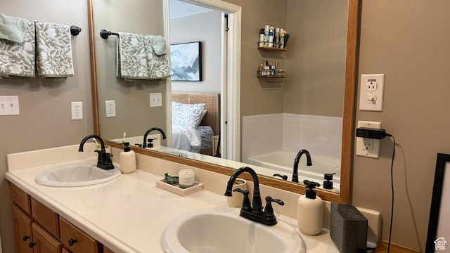 1205 E Privet Dr S Unit 101, Cottonwood Heights, UT 84121 - bathroom featuring connected bathroom, double vanity, and a tub to relax in