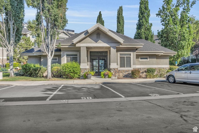 1205 E Privet Dr S Unit 101, Cottonwood Heights, UT 84121 - view of building exterior featuring uncovered parking