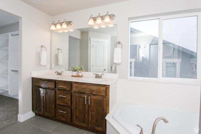 5001 W Anegada Ln S, Herriman, UT 84096 - bathroom featuring tile patterned floors, double vanity, and a bath