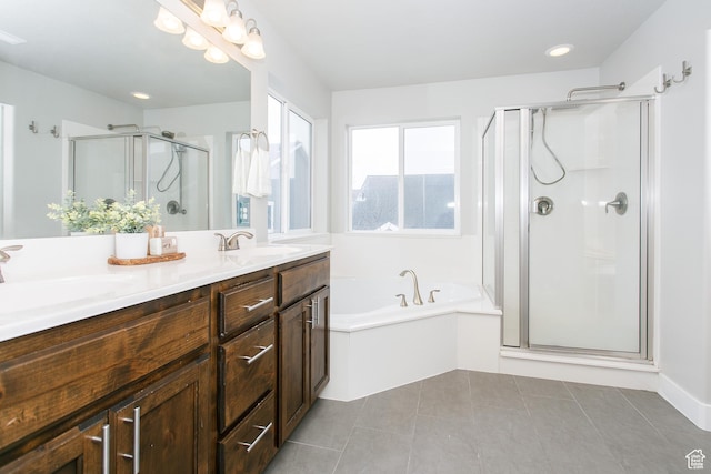 5001 W Anegada Ln S, Herriman, UT 84096 - bathroom featuring a stall shower, double vanity, a garden tub, and tile patterned flooring