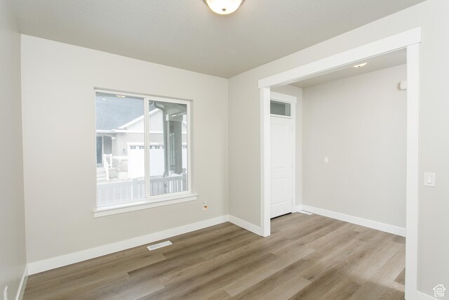 5001 W Anegada Ln S, Herriman, UT 84096 - empty room featuring wood finished floors and baseboards