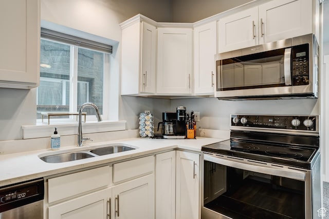 768 E 800 S, Salt Lake City, UT 84102 - kitchen with stainless steel appliances, white cabinetry, and light countertops