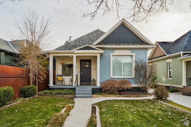 768 E 800 S, Salt Lake City, UT 84102 - view of front of home featuring board and batten siding and a porch