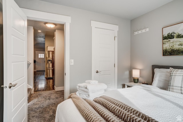768 E 800 S, Salt Lake City, UT 84102 - carpeted bedroom with stainless steel refrigerator with ice dispenser and baseboards