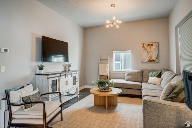 768 E 800 S, Salt Lake City, UT 84102 - living area featuring wood finished floors and a chandelier