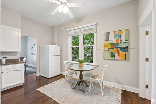 921 E 800 S, Salt Lake City, UT 84102 - dining area with dark wood-type flooring, arched walkways, and a ceiling fan