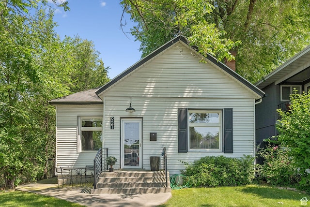 921 E 800 S, Salt Lake City, UT 84102 - view of front facade with a front yard and a chimney
