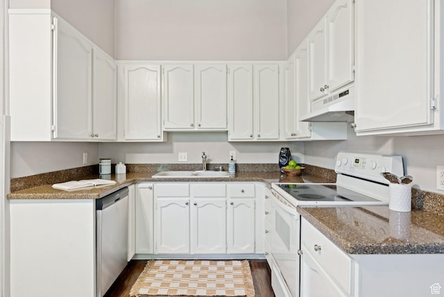 921 E 800 S, Salt Lake City, UT 84102 - kitchen with white range with electric cooktop, dishwasher, under cabinet range hood, white cabinetry, and dark countertops